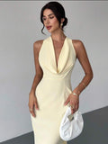 Vestido con cuello halter, escote profundo en v y espalda descubierta