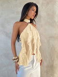 Blusa cuello alto beige