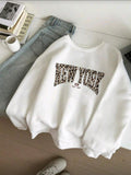 Sueter New york animal print L