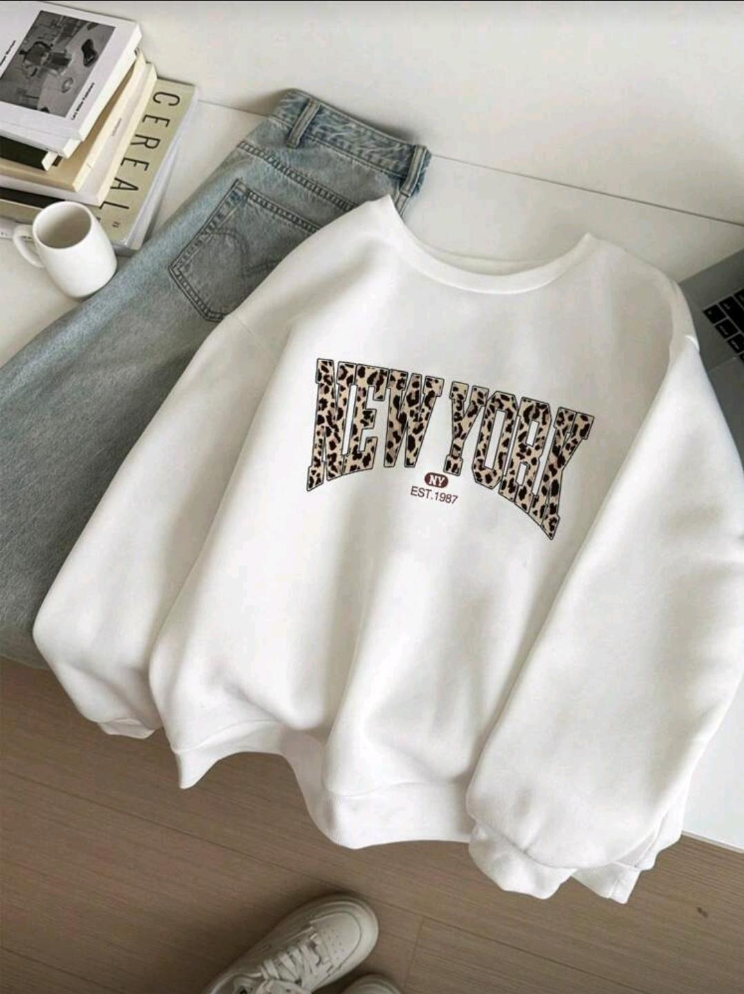 Sueter New york animal print L