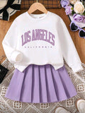 Conjunto de buzo y falda plizada
