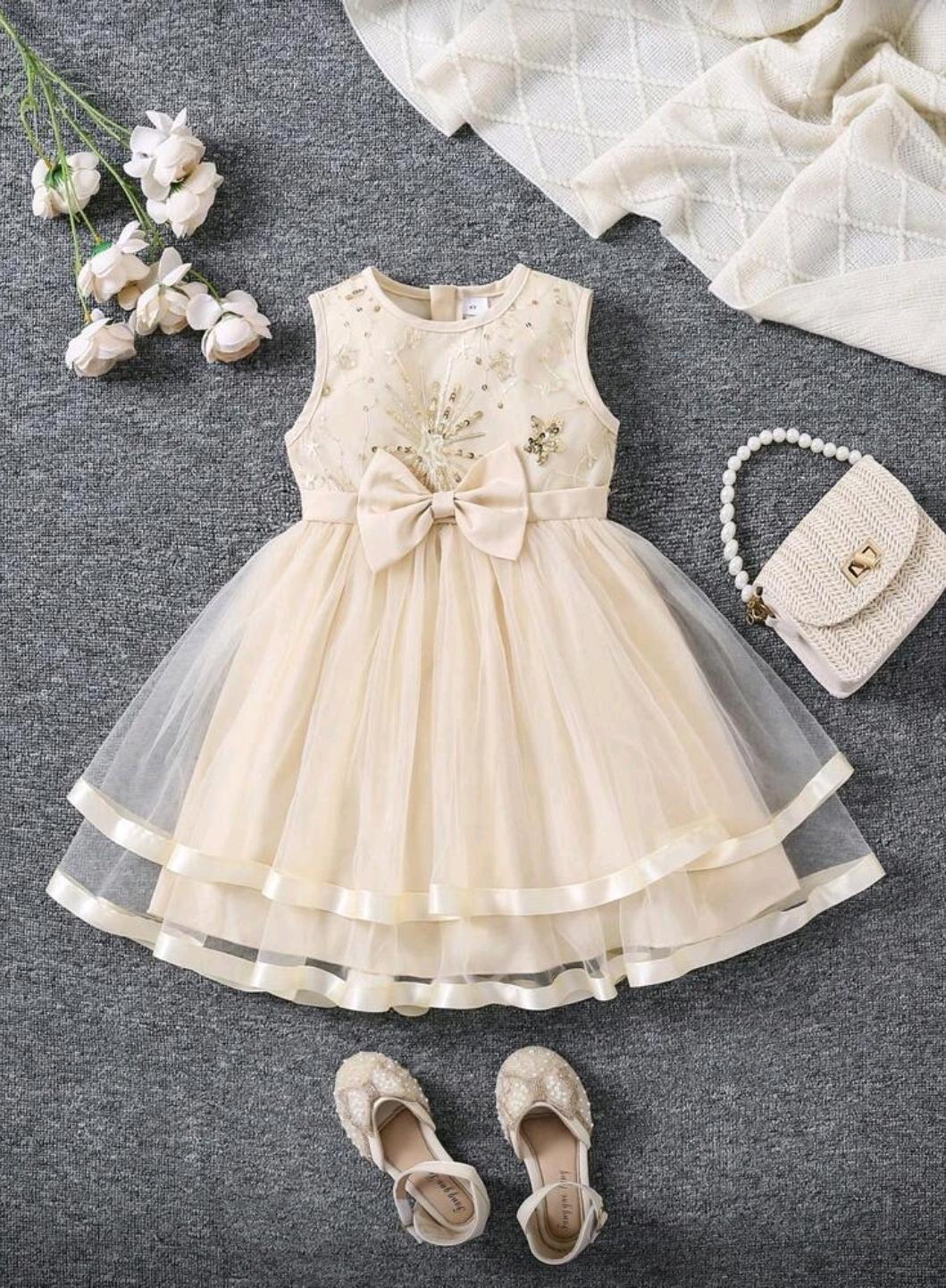 Vestido beige con lazo 5y