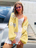 Cardigan amarillo con flores