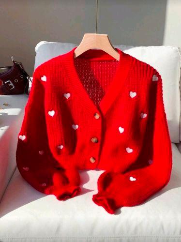 Sueter rojo de corazones