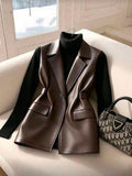 Chaleco tipo blazer largo de cuerina
