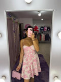 Vestido blanco con estampado rosa