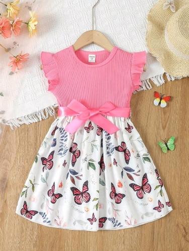 Vestido de mariposa y moño